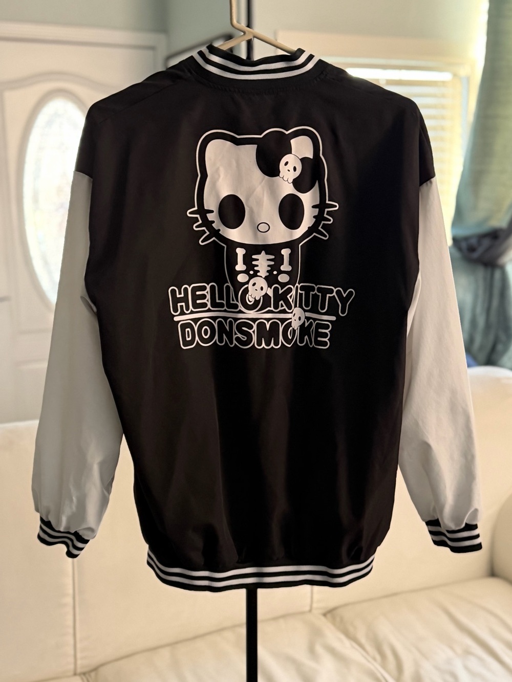 Hello Kitty x DonSmoke Black and White Varsity Jacket with Skull Graphic M/L